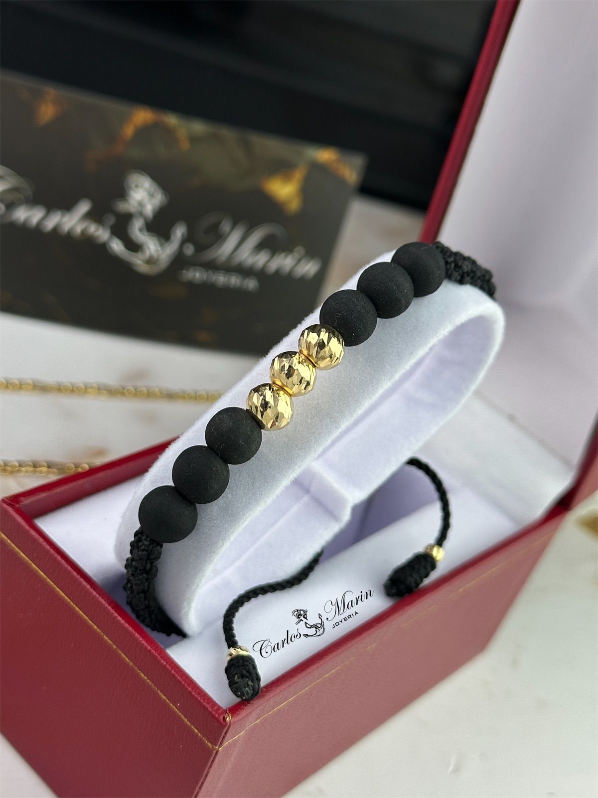 Pulsera Tejido Negro con 3 Balines #7 Diamantados en Oro 18K