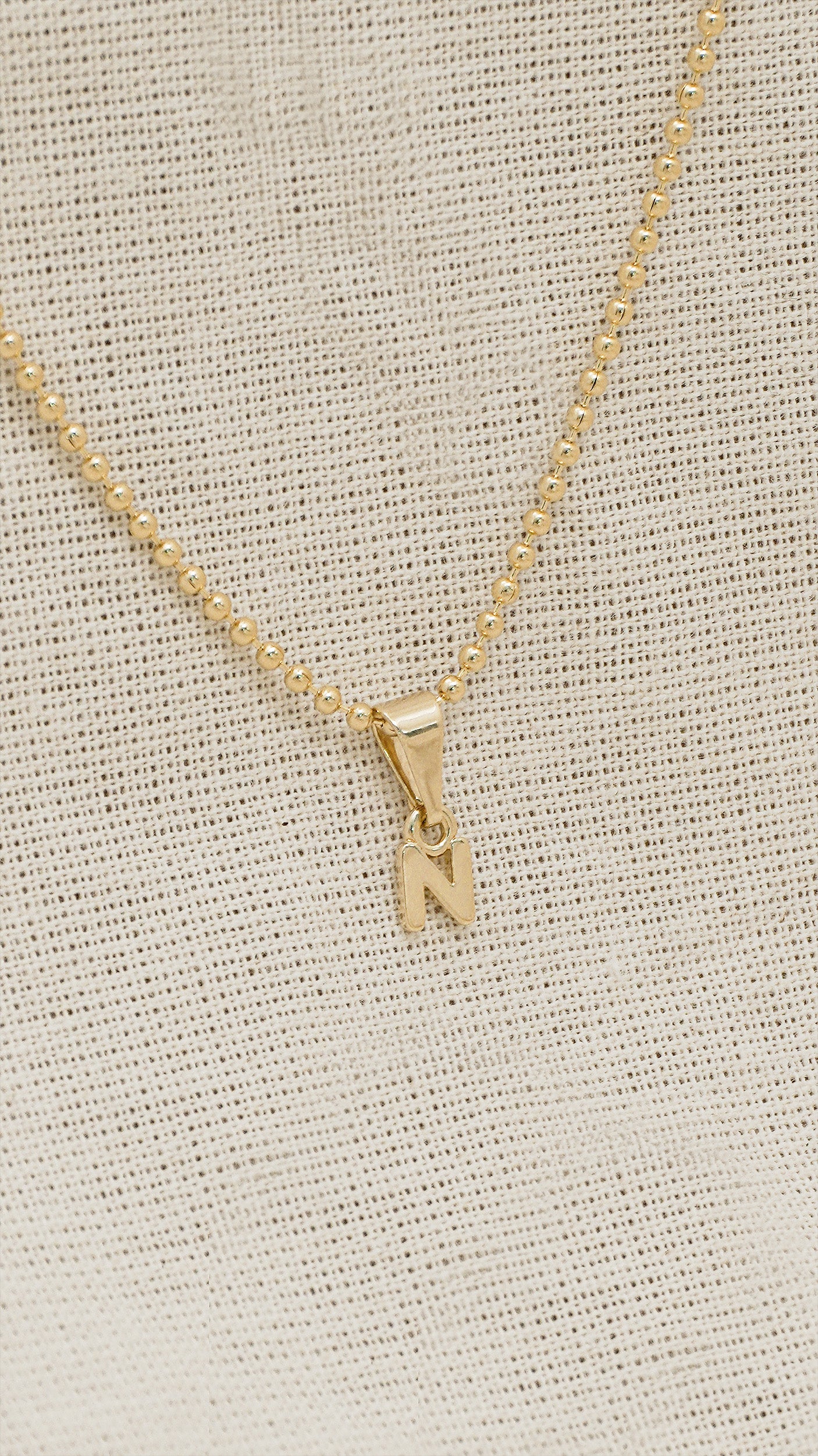 Dije Letra N en Oro Laminado