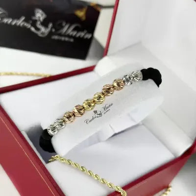 Pulsera Tejido Negro Con balines #6 en Tres Oros 18K