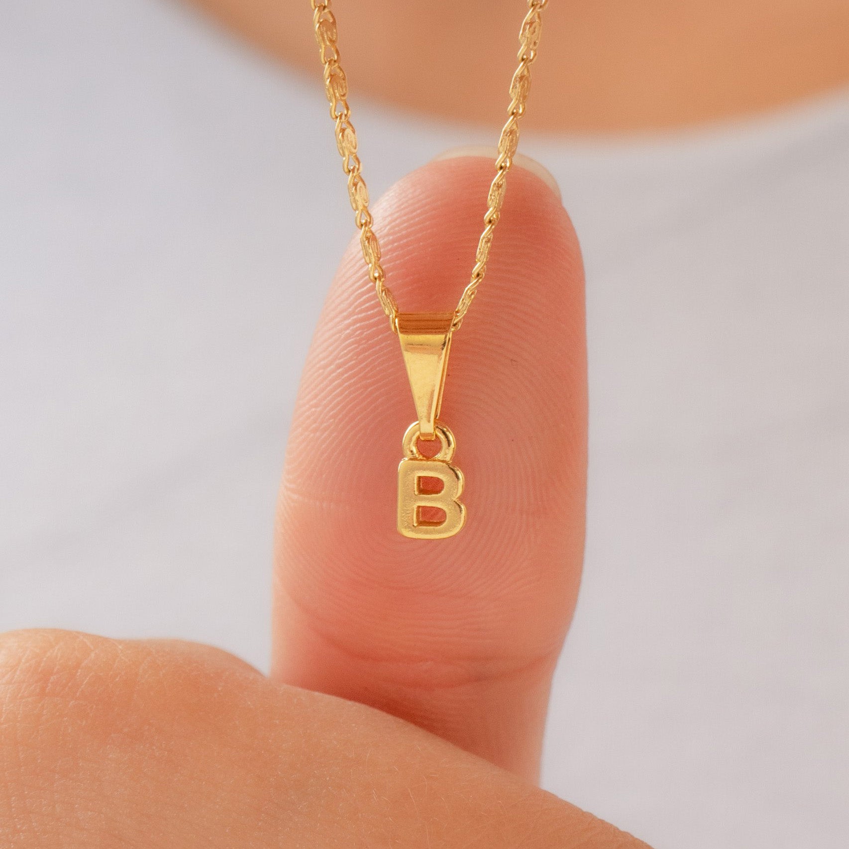 Dije Letras B en Oro Laminado