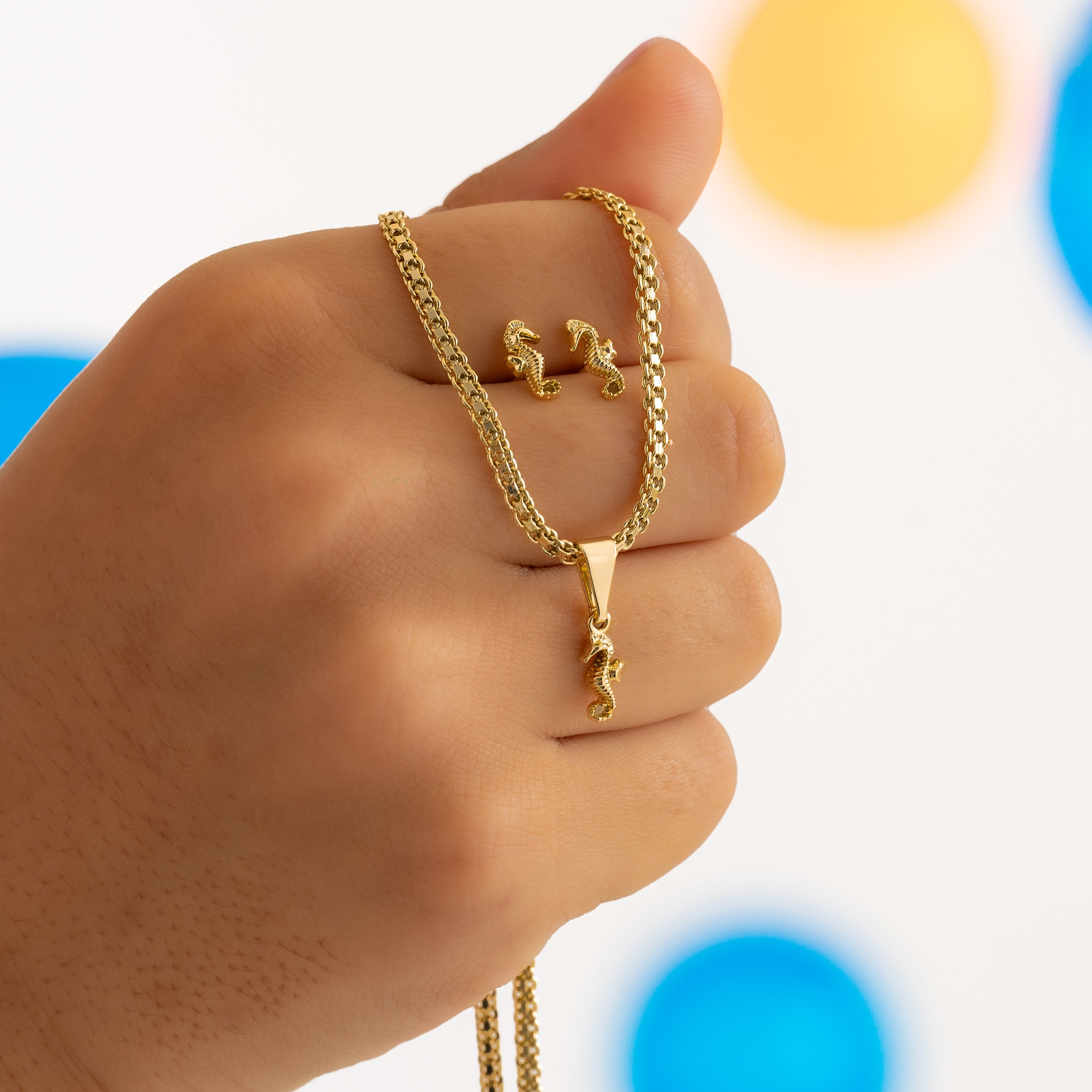 Topos Caballito de Mar Oro Laminado