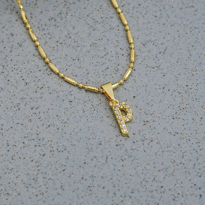 Dije Letra P en Oro Laminado