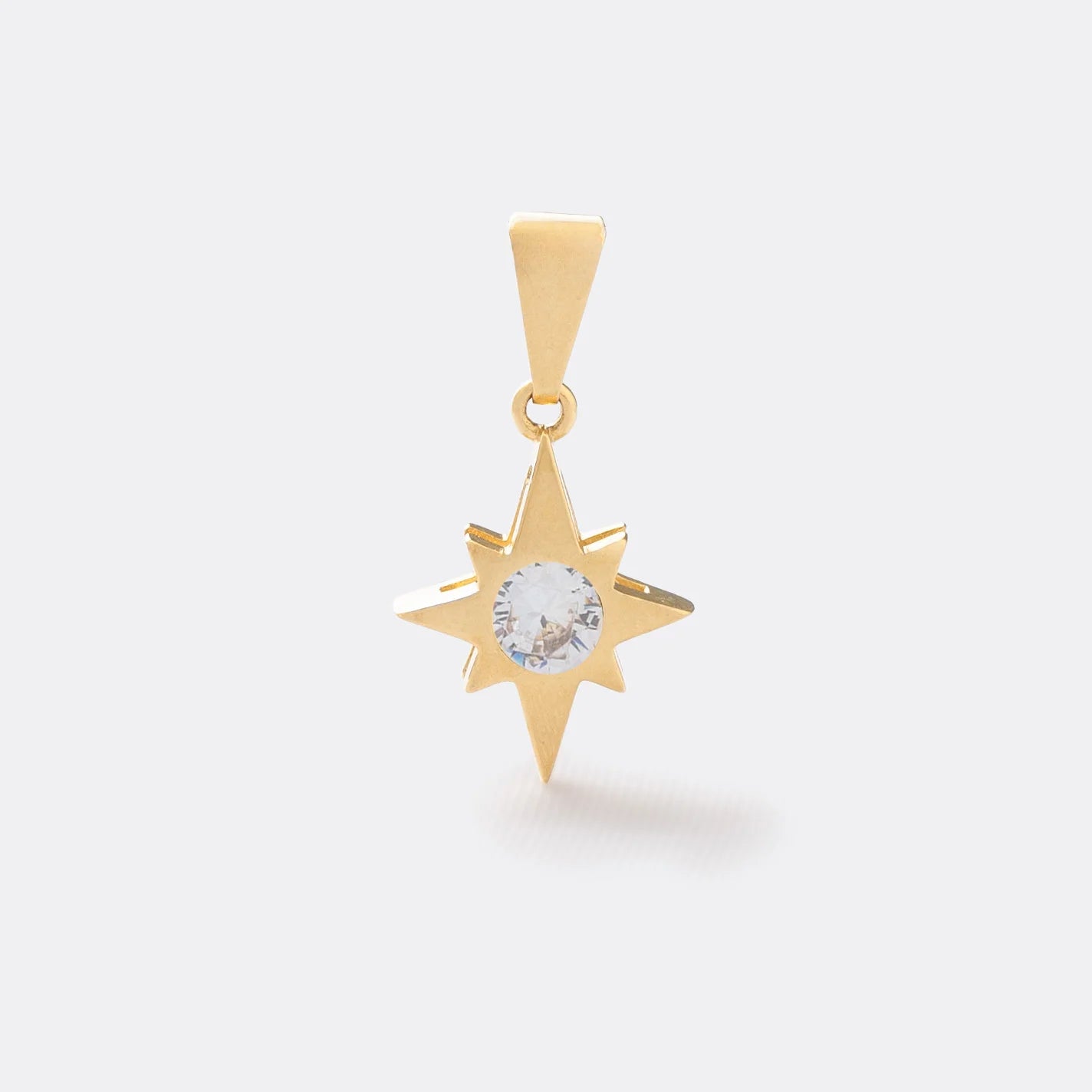 Dije Estrella con Circonia Cristal en Oro Laminado