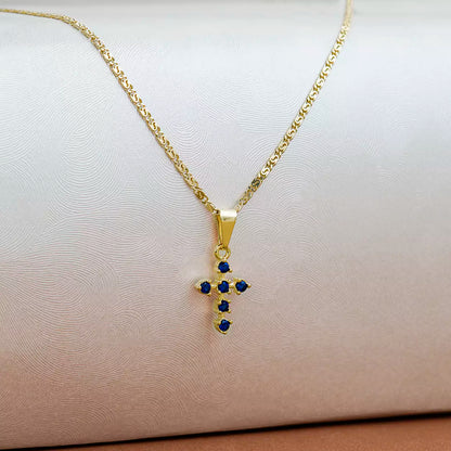 Dije Cruz con 6 Circonias Azules en Oro Laminado