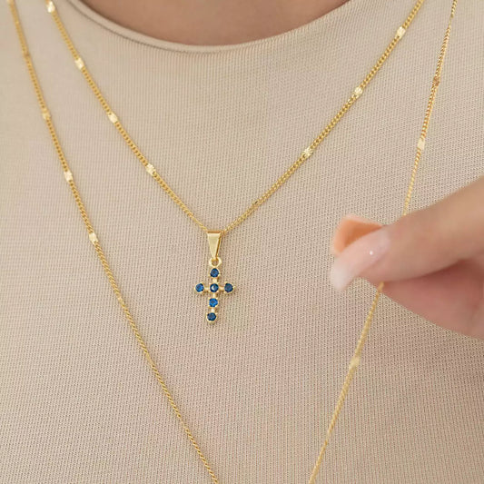 Dije Cruz con 6 Circonias Azules en Oro Laminado