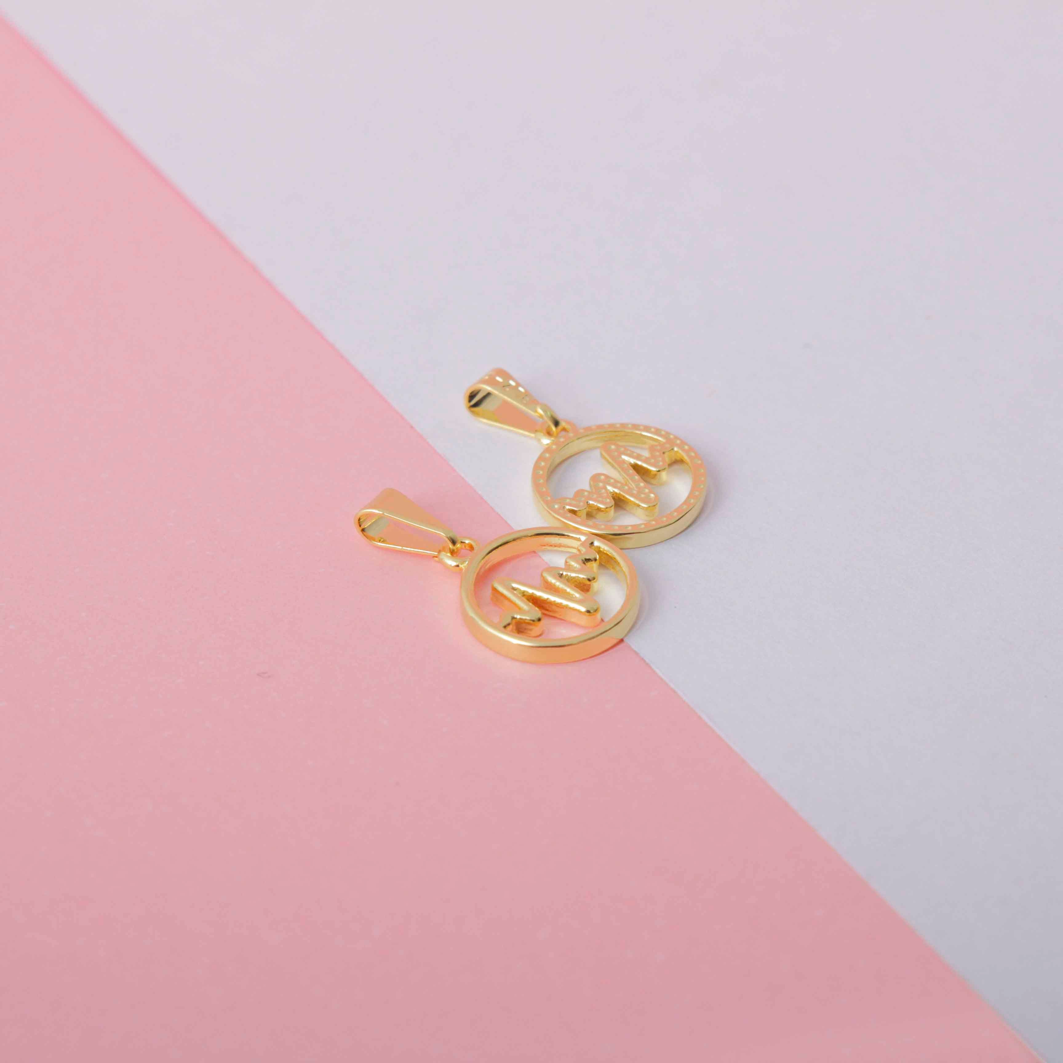 Dije Wave en Oro Laminado