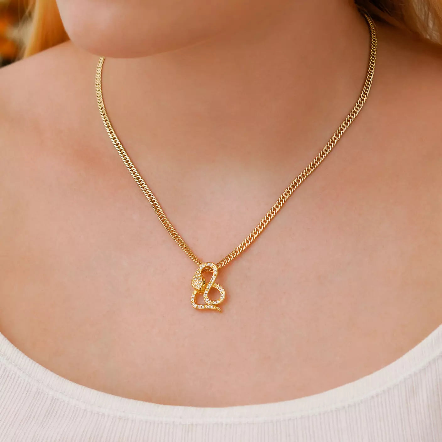Dije Snake en Oro Laminado