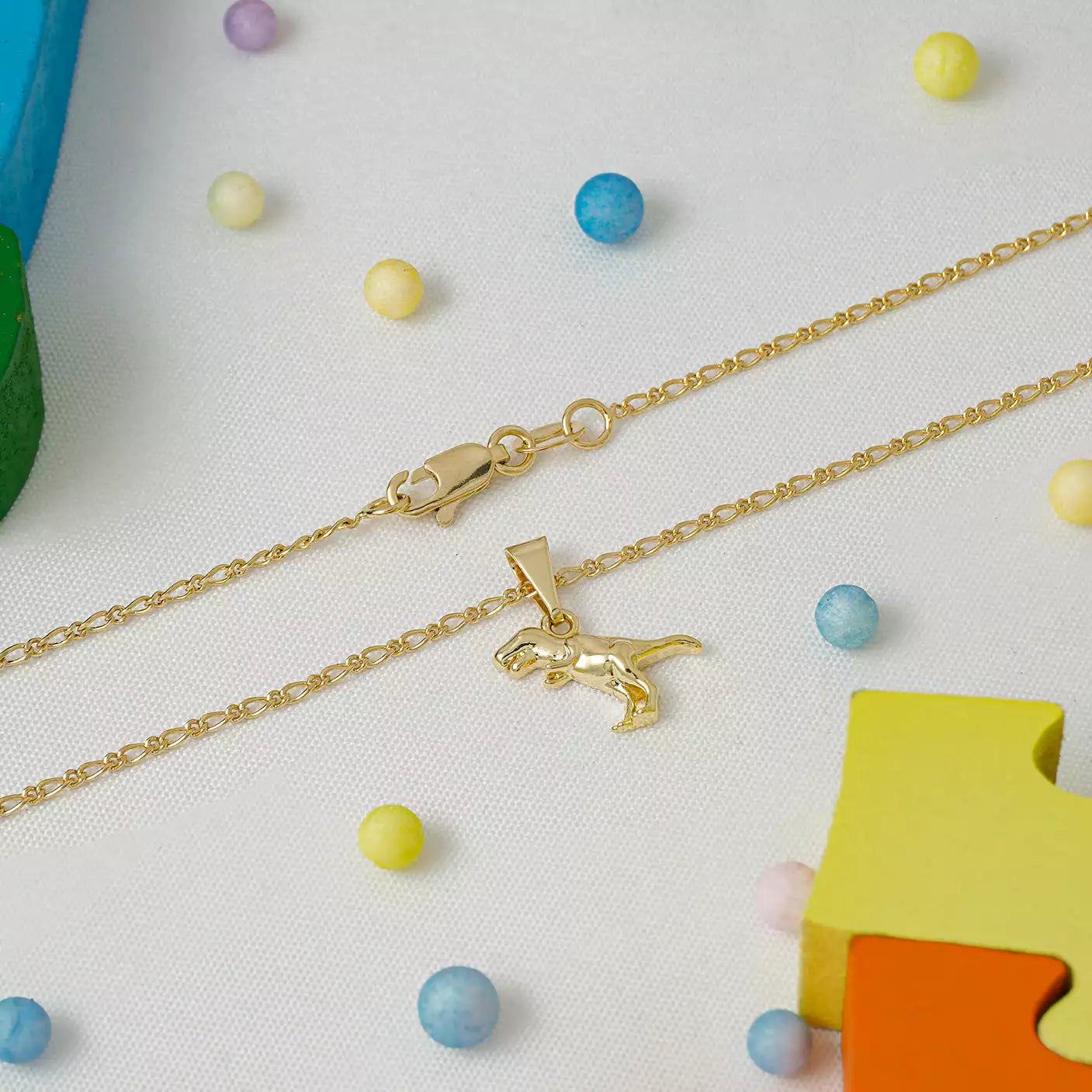 Dije T-Rex en Oro Laminado