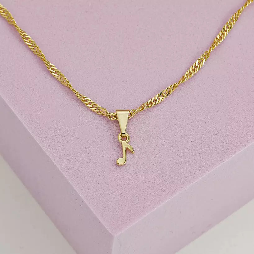 Dije Corchea en Oro Laminado