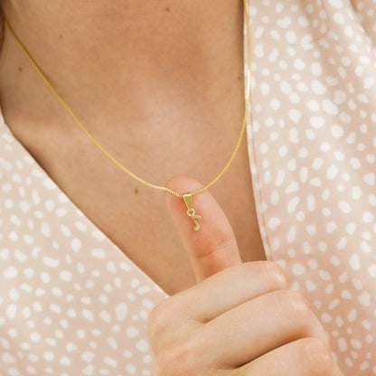 Dije Corchea en Oro Laminado