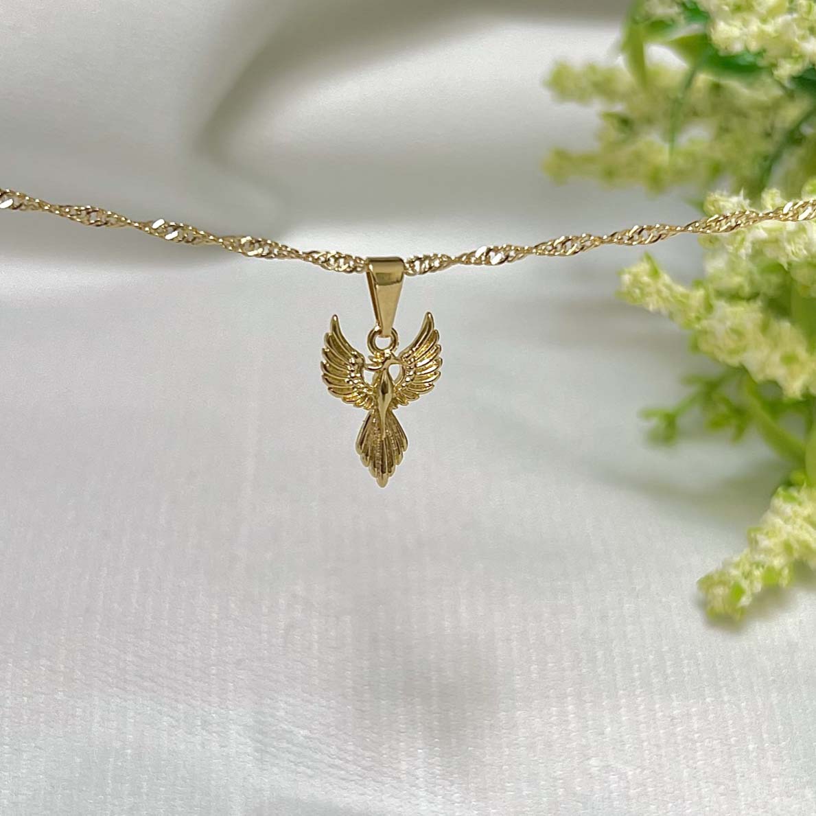 Dije Fénix en Oro Laminado