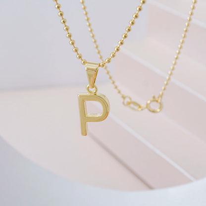Dije Letras P en Oro Laminado