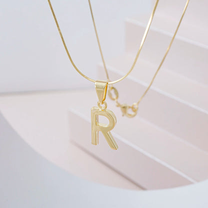 Dije Letras R en Oro Laminado