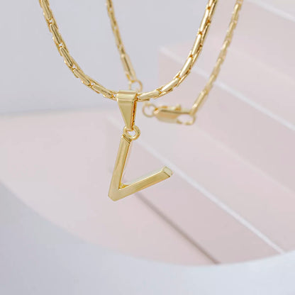 Dije Letras V en Oro Laminado