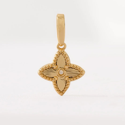 Dije Lottus en Oro Laminado