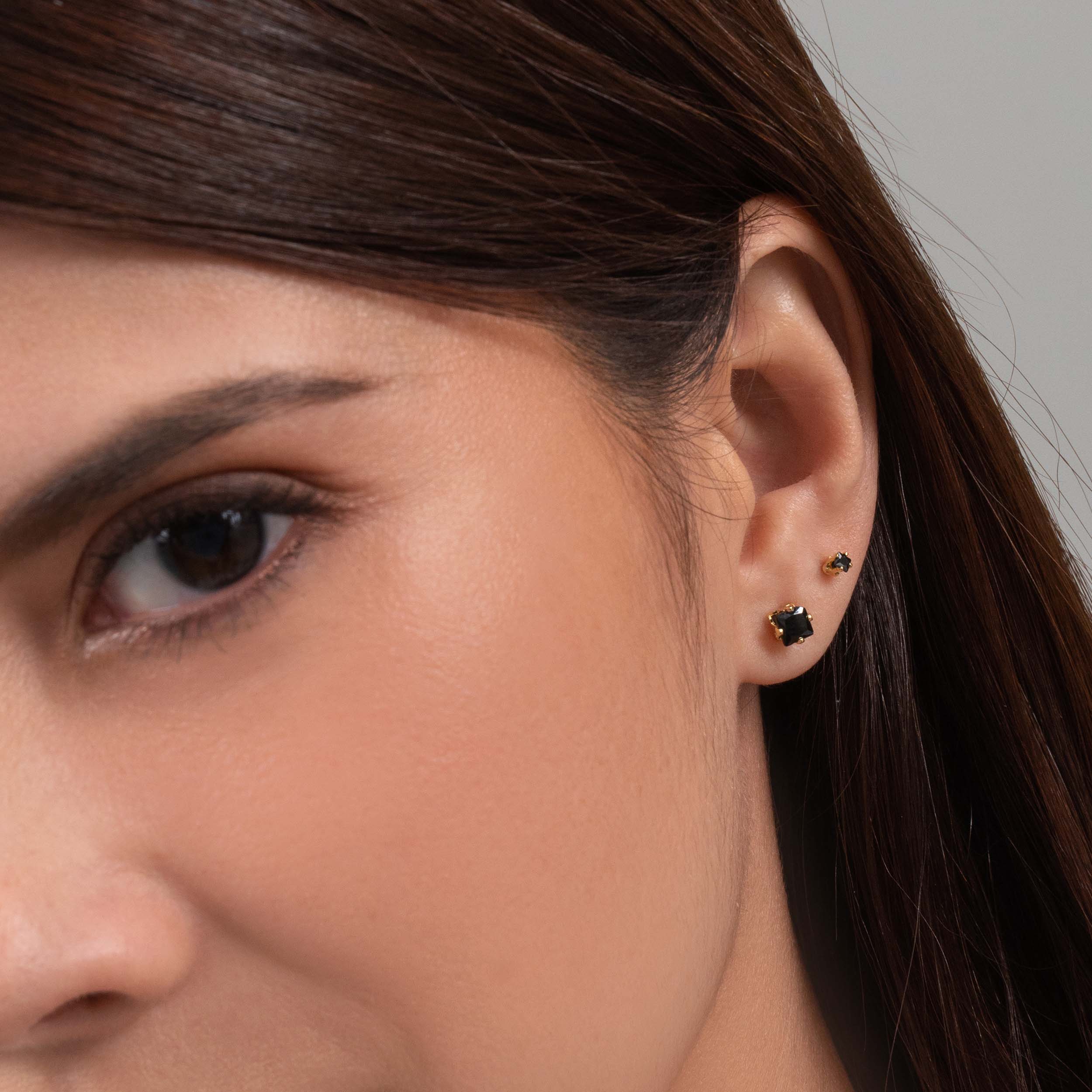 Topos Circon Redondo Negro Oro Laminado