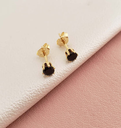 Topos Circon Redondo Negro Oro Laminado