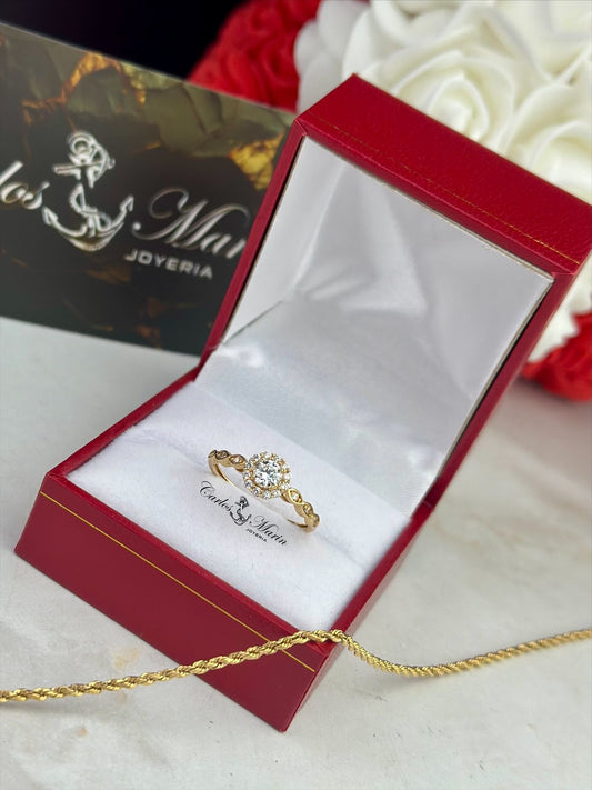Anillo Solitario Princesa Cruzado en Oro 18K