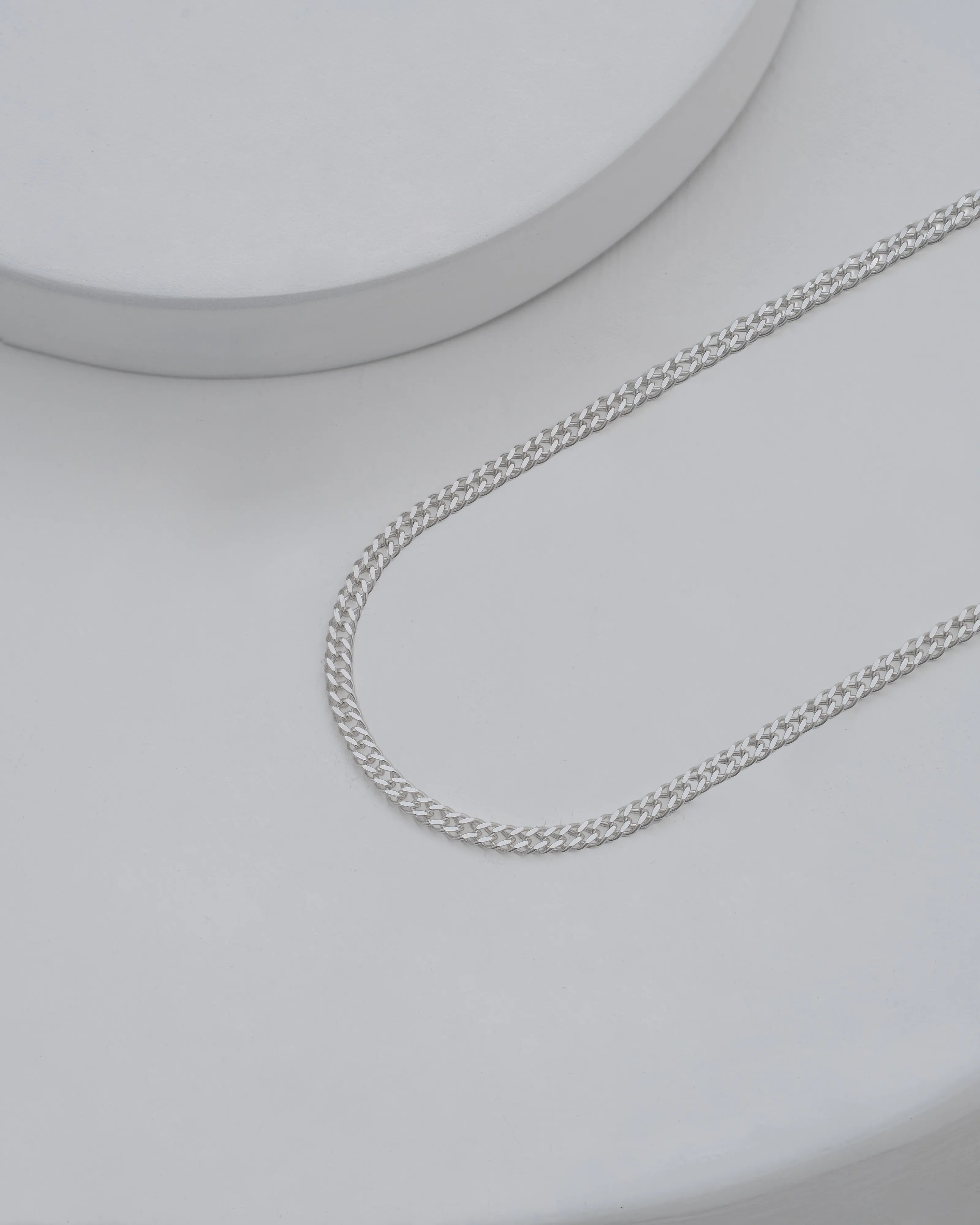 Cadena Cubana Cruzada 2,4 mm 65 cm en Plata