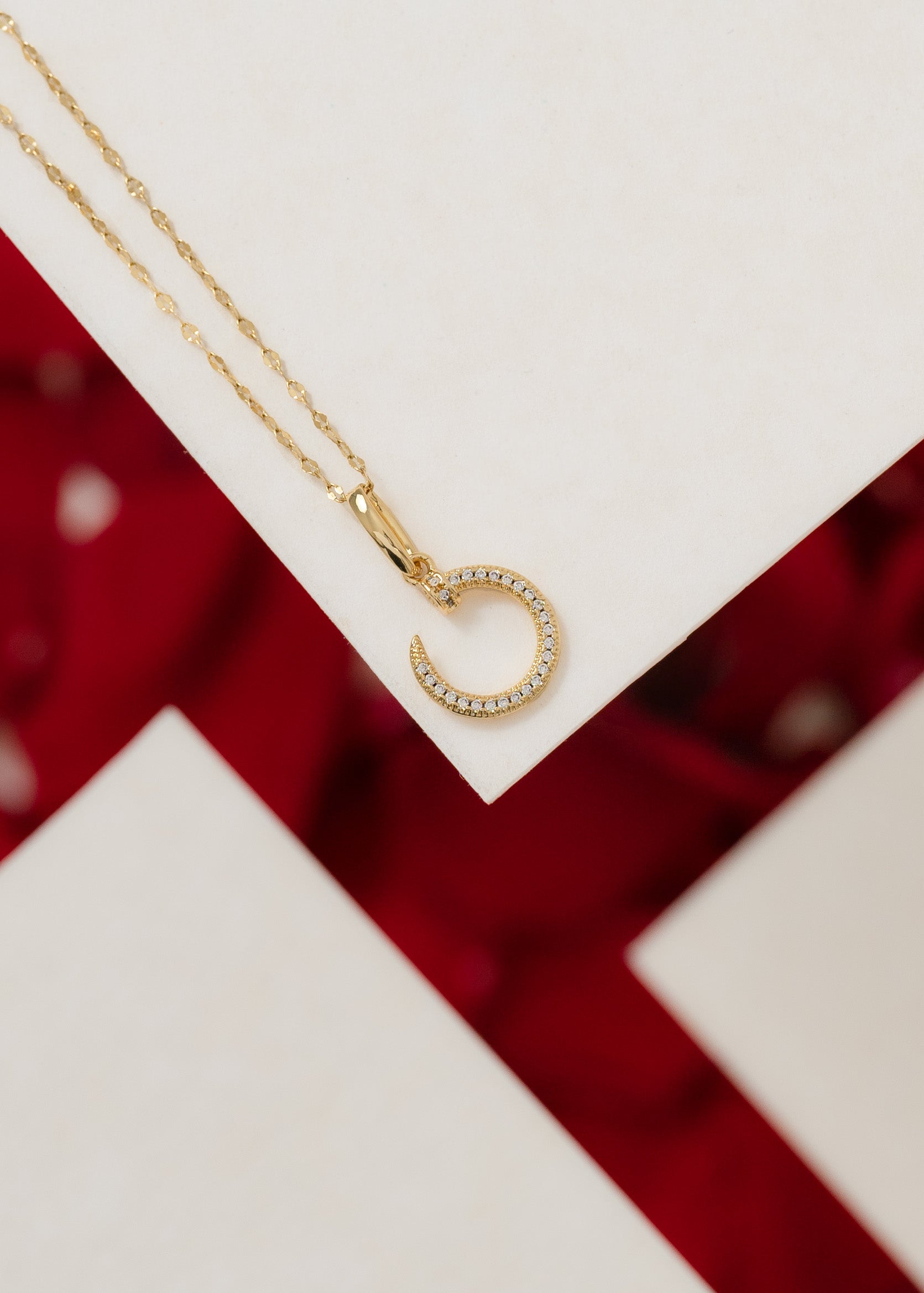 Dije CT Clou en Oro Laminado