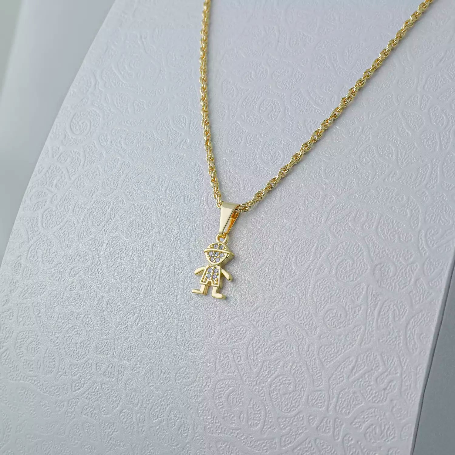 Dije Niño en Oro Laminado