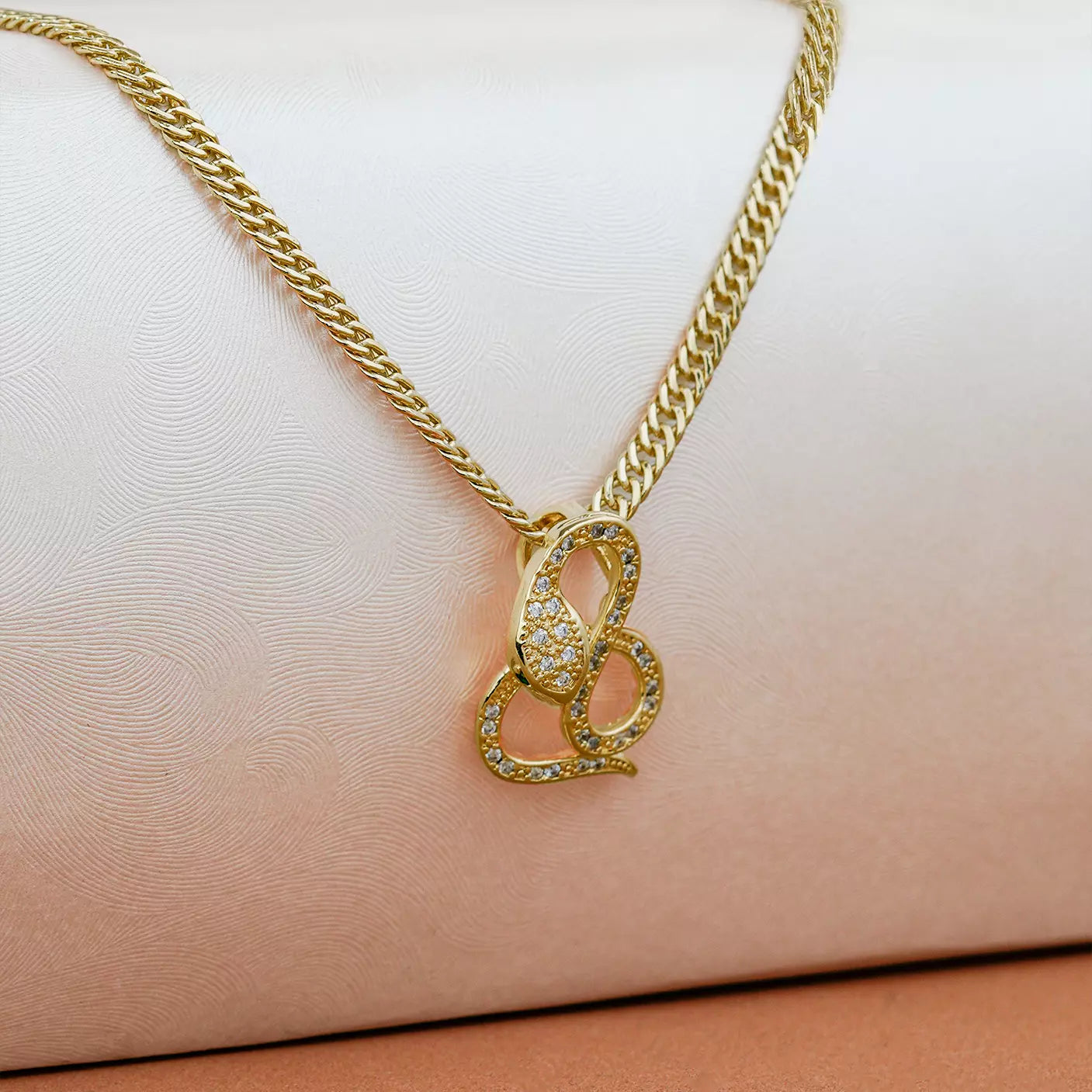 Dije Snake en Oro Laminado