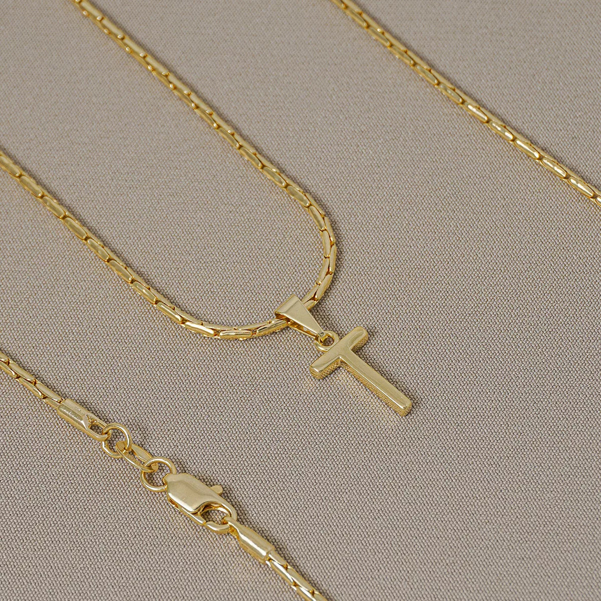 Dije Letras T en Oro Laminado