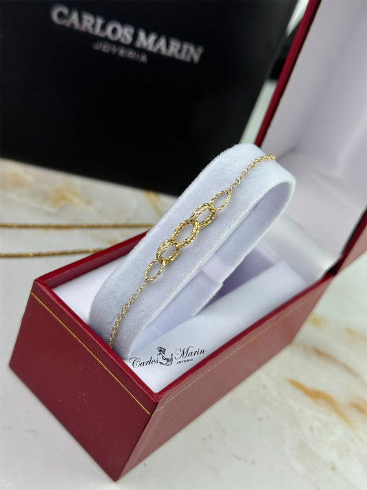 Pulsera Tejido Aros Centro de 18.5 cm en Oro 18K