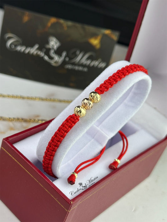 Pulsera Tejido Rojo con 3 Balines #6 Diamantados en Dos Oros 18K