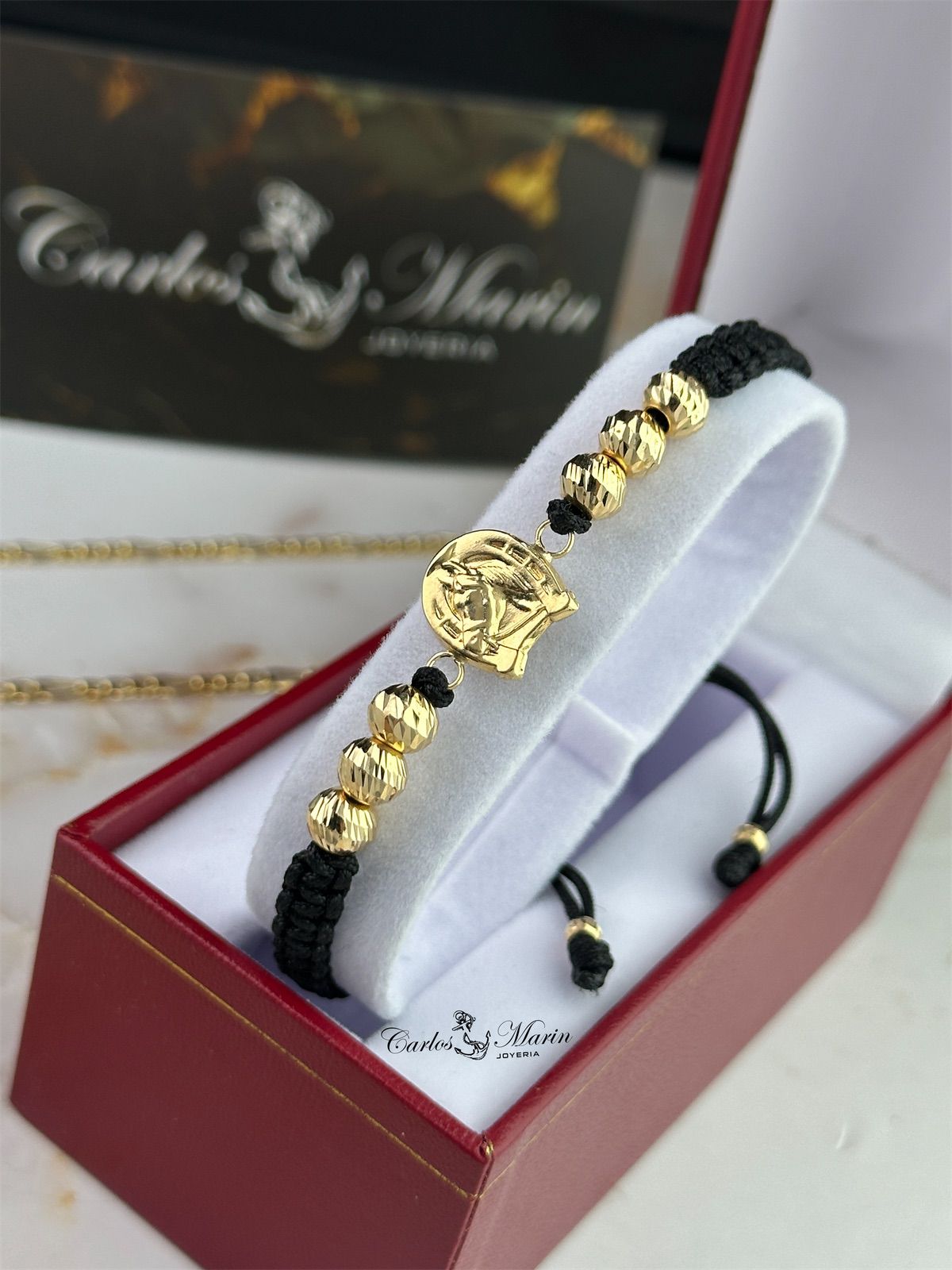 Pulsera Tejido Negro con 6 Balines #6 y Herraje Herradura en Oro 18K