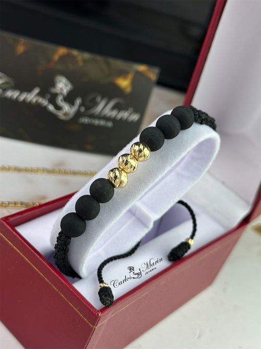 Pulsera Tejido Negro con 3 Balines #7 Diamantados en Oro 18K