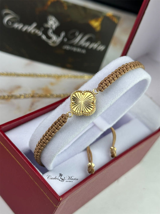 Pulsera Tejida Nude con Herraje Trébol Diamantado en Oro 18K