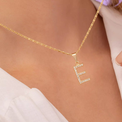 Dije Letras E en Oro Laminado