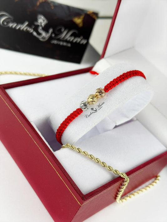 Pulsera tejida con 3 balines #6 diamantados 3 oros 18K elegante