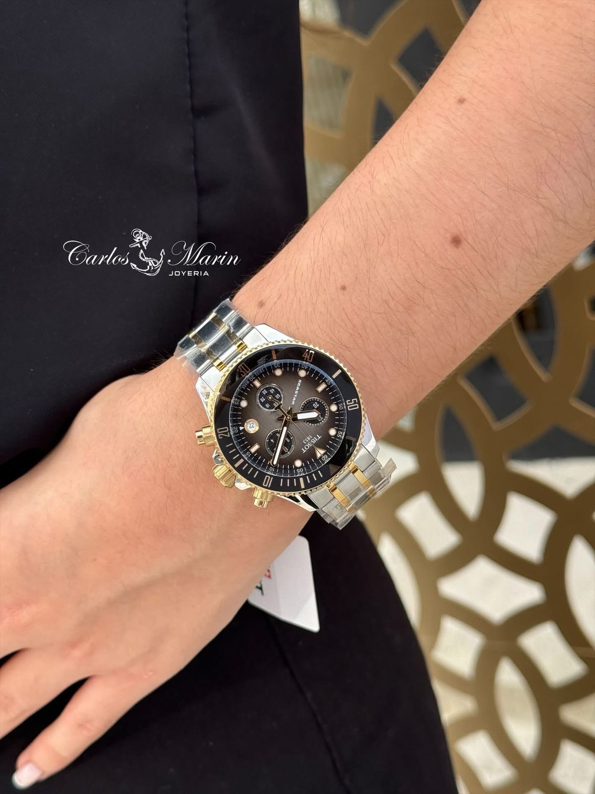 Reloj Tissot Seastar unisex negro bicolor T120.217.22