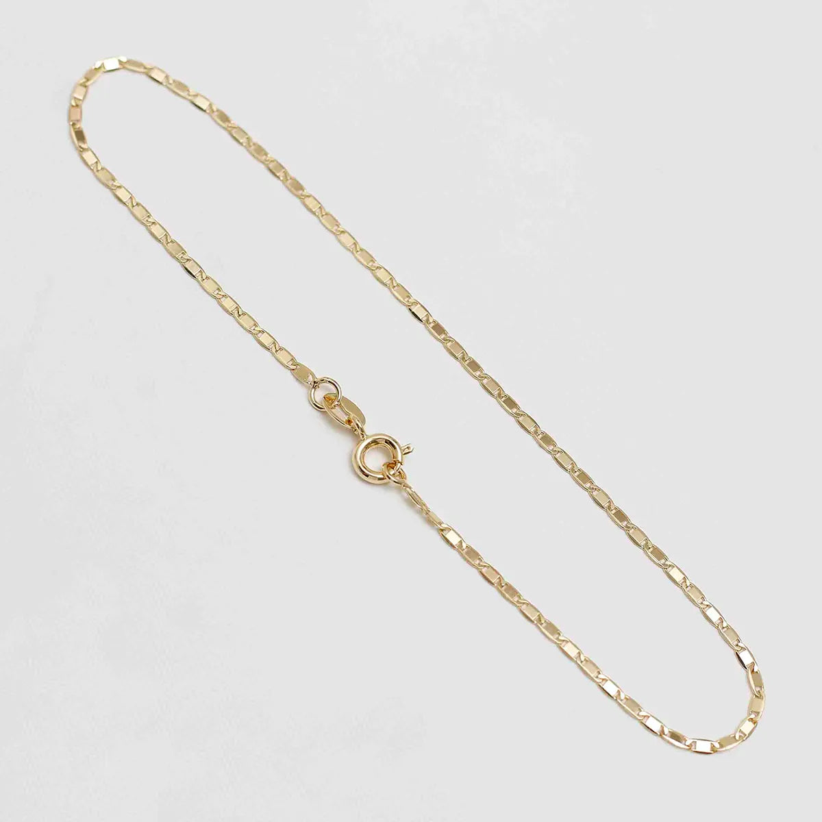 Tobillera Escalera Delgada Plana Lisa en Oro Laminado – 24.5 cm