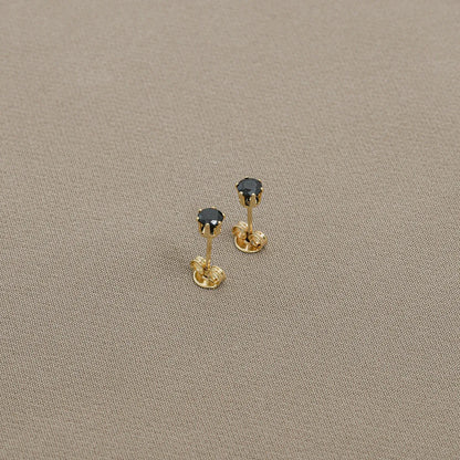 Topos Circon Redondo Negro Oro Laminado