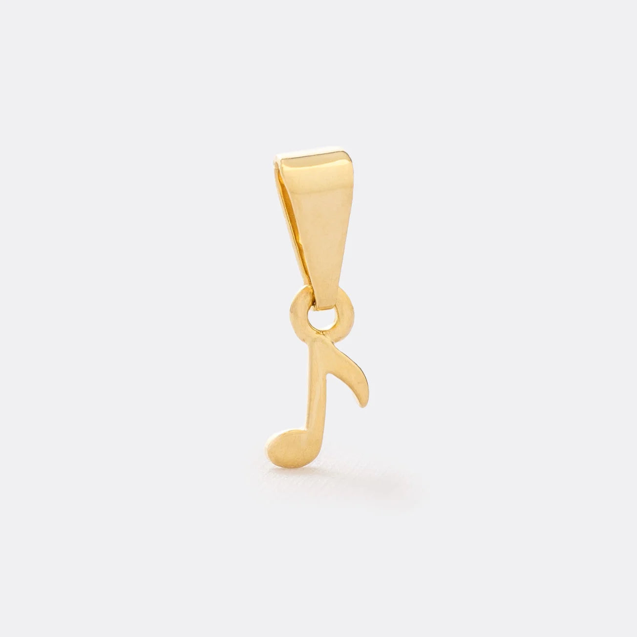 Dije Corchea en Oro Laminado