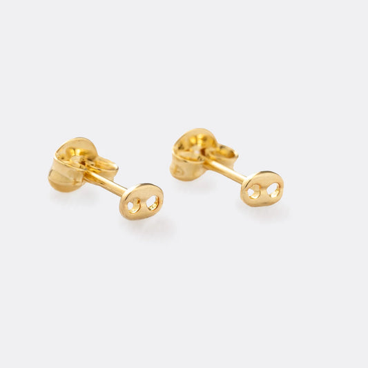 Topos G-ucci Finito en Oro Laminado